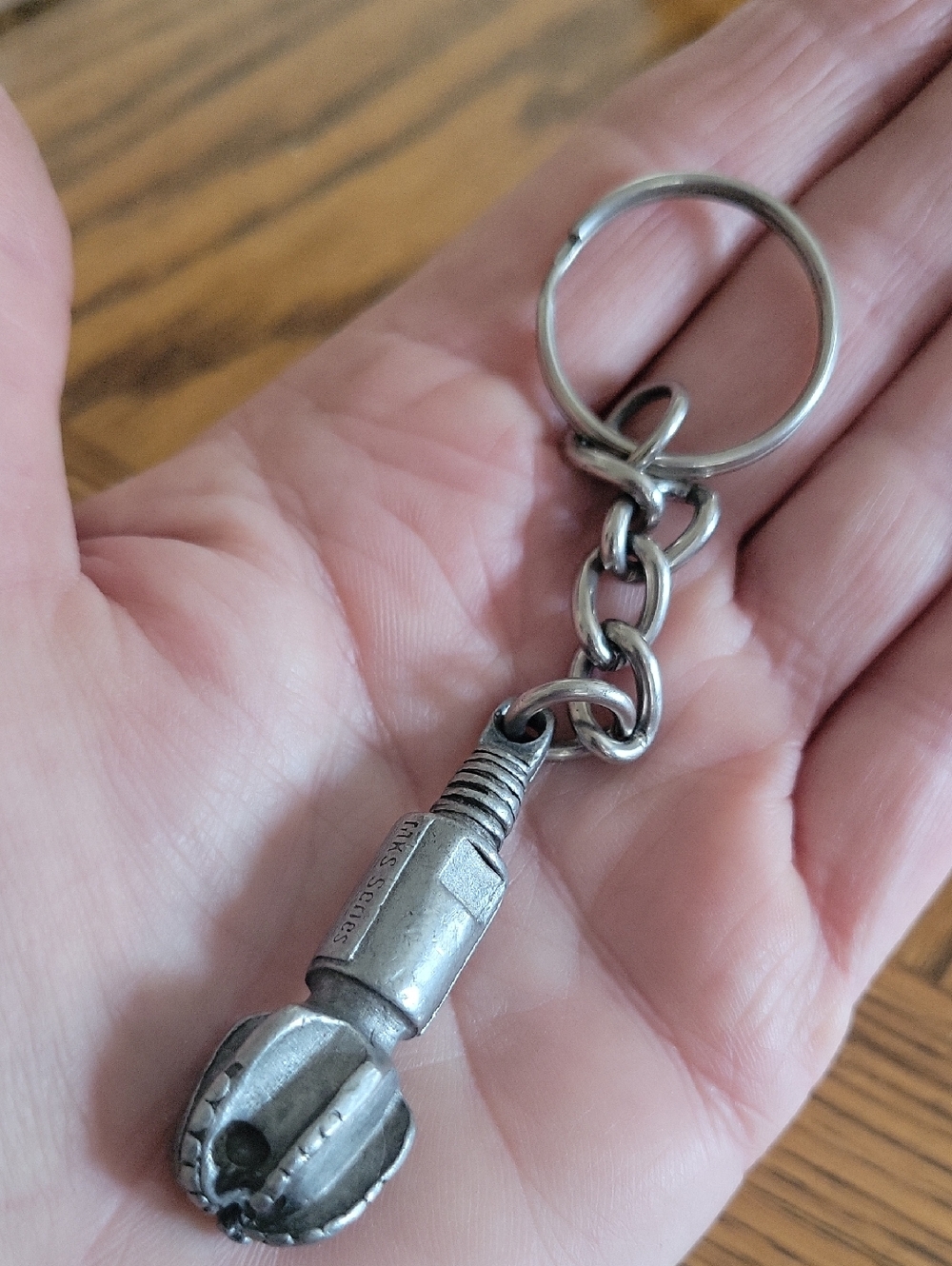 Silver Metal Novelty Keychain with Mechanical Drill Bit Charm